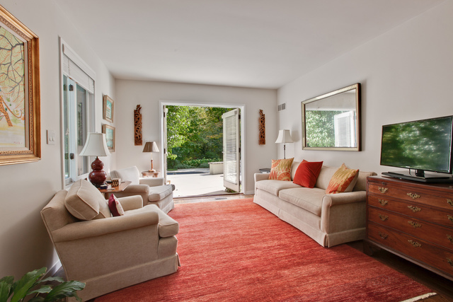 435 Thorne Lane Lake Forest, IL 60045 - Photo 37 of 42 a living room with furniture and a flat screen tv