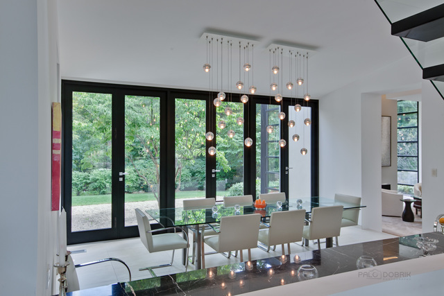 435 Thorne Lane Lake Forest, IL 60045 - Photo 7 of 42 a living room with furniture and large windows