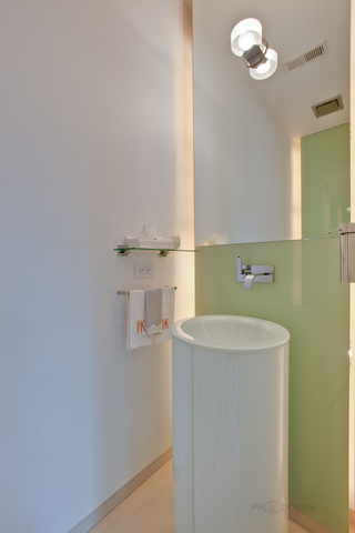 435 Thorne Lane Lake Forest, IL 60045 - Photo 10 of 42 a bathroom with a sink a mirror and a shower