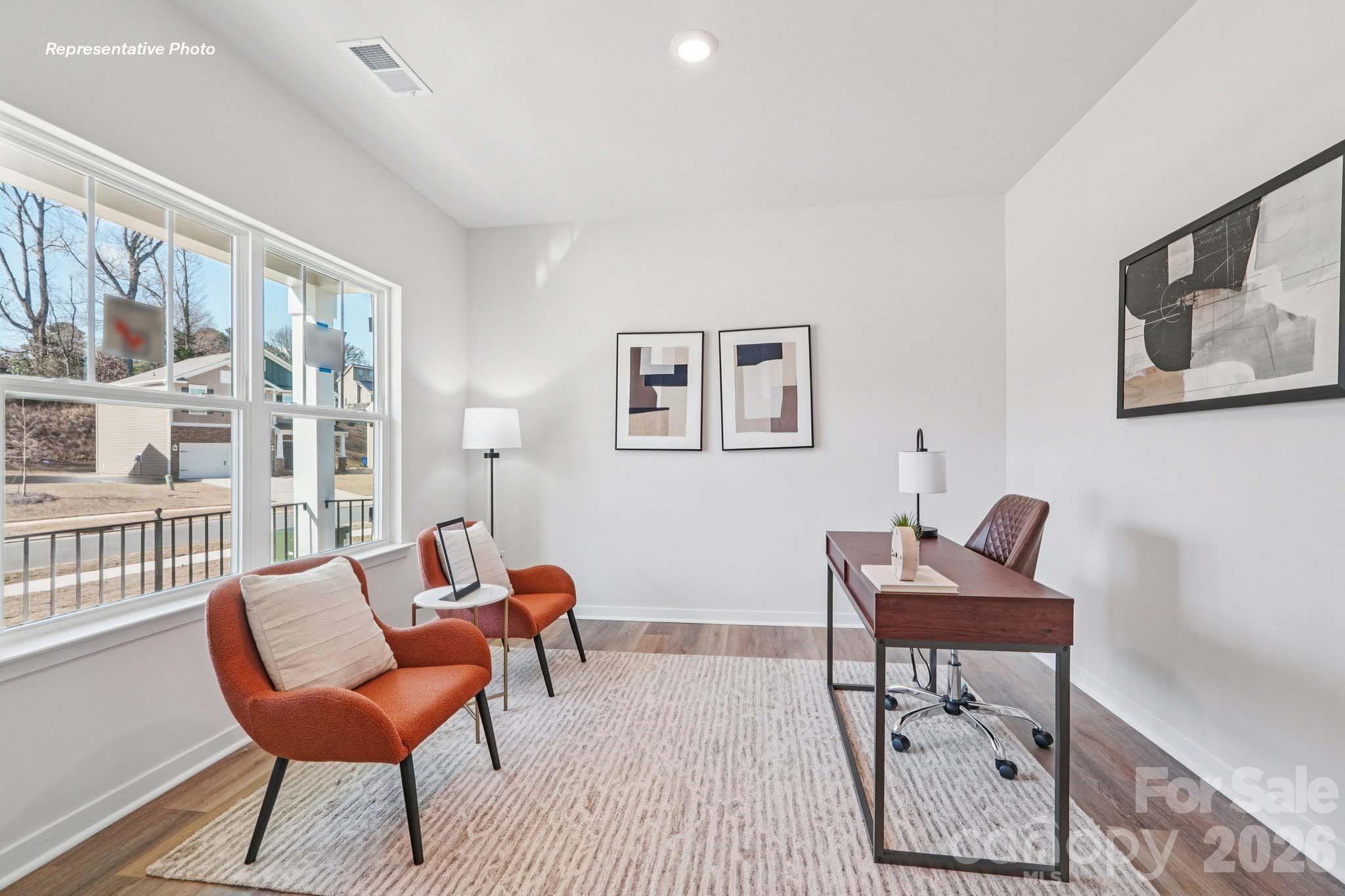 7600 Bainbridge Road Sherrills Ford, NC 28673 - Photo 13 of 39 a living room with furniture and a large window
