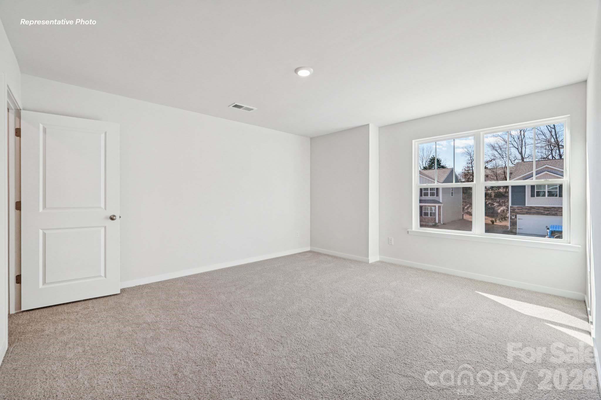 7600 Bainbridge Road Sherrills Ford, NC 28673 - Photo 25 of 39 a view of an empty room with a window