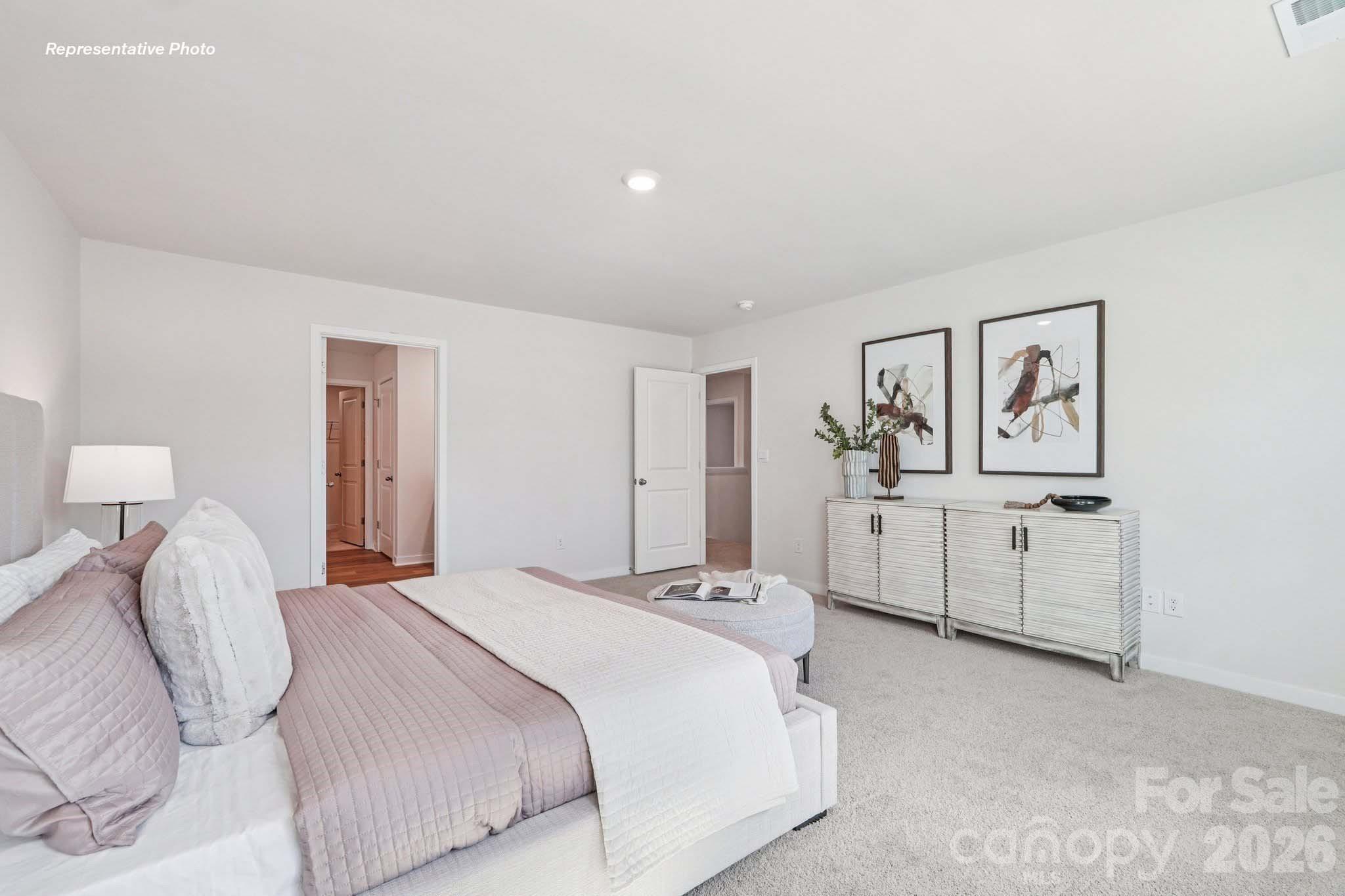 7600 Bainbridge Road Sherrills Ford, NC 28673 - Photo 29 of 39 a bedroom with a bed and a night stand