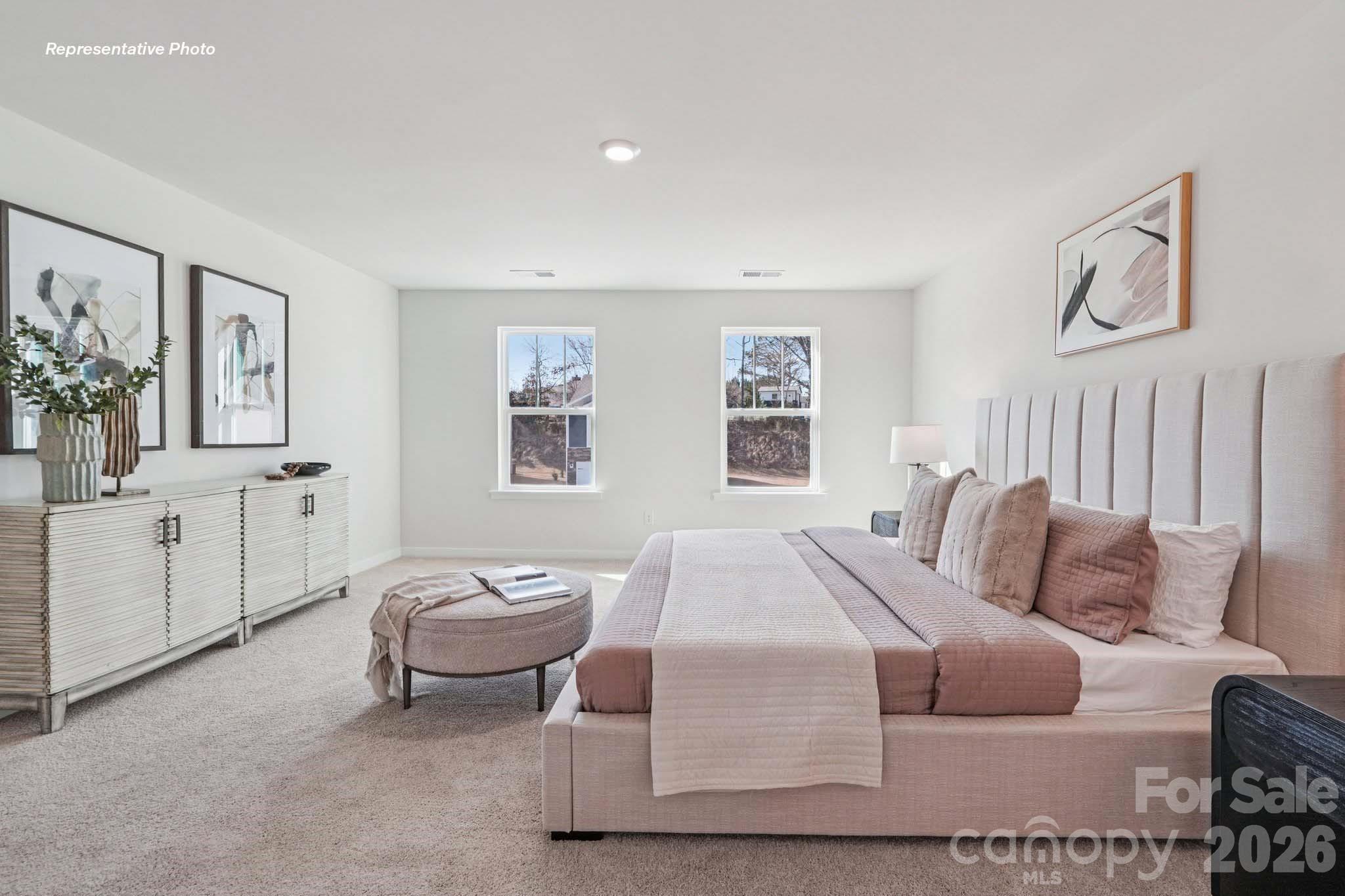 7600 Bainbridge Road Sherrills Ford, NC 28673 - Photo 30 of 39 a bedroom with furniture and window