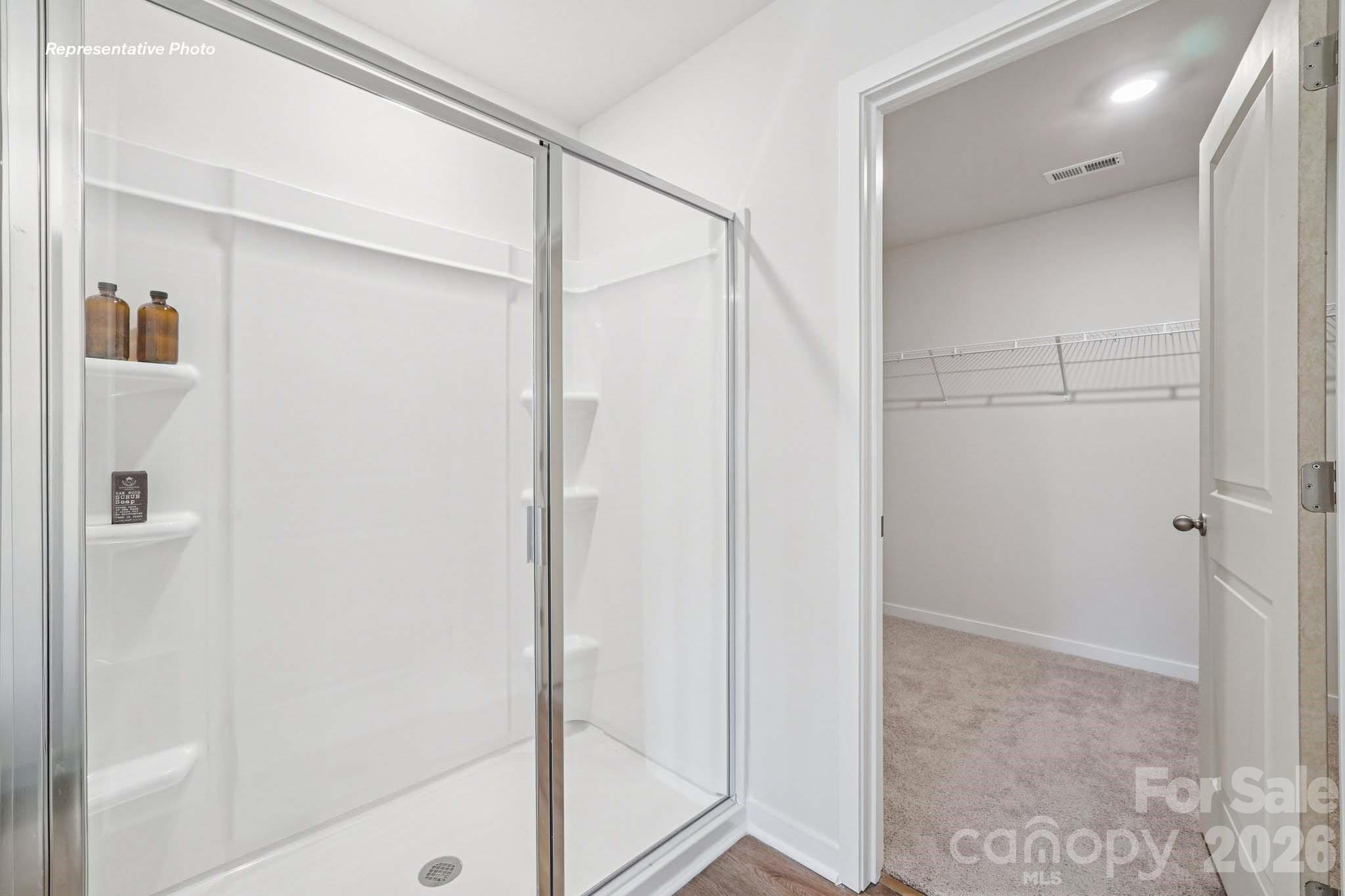 7600 Bainbridge Road Sherrills Ford, NC 28673 - Photo 31 of 39 a bathroom with a glass shower door