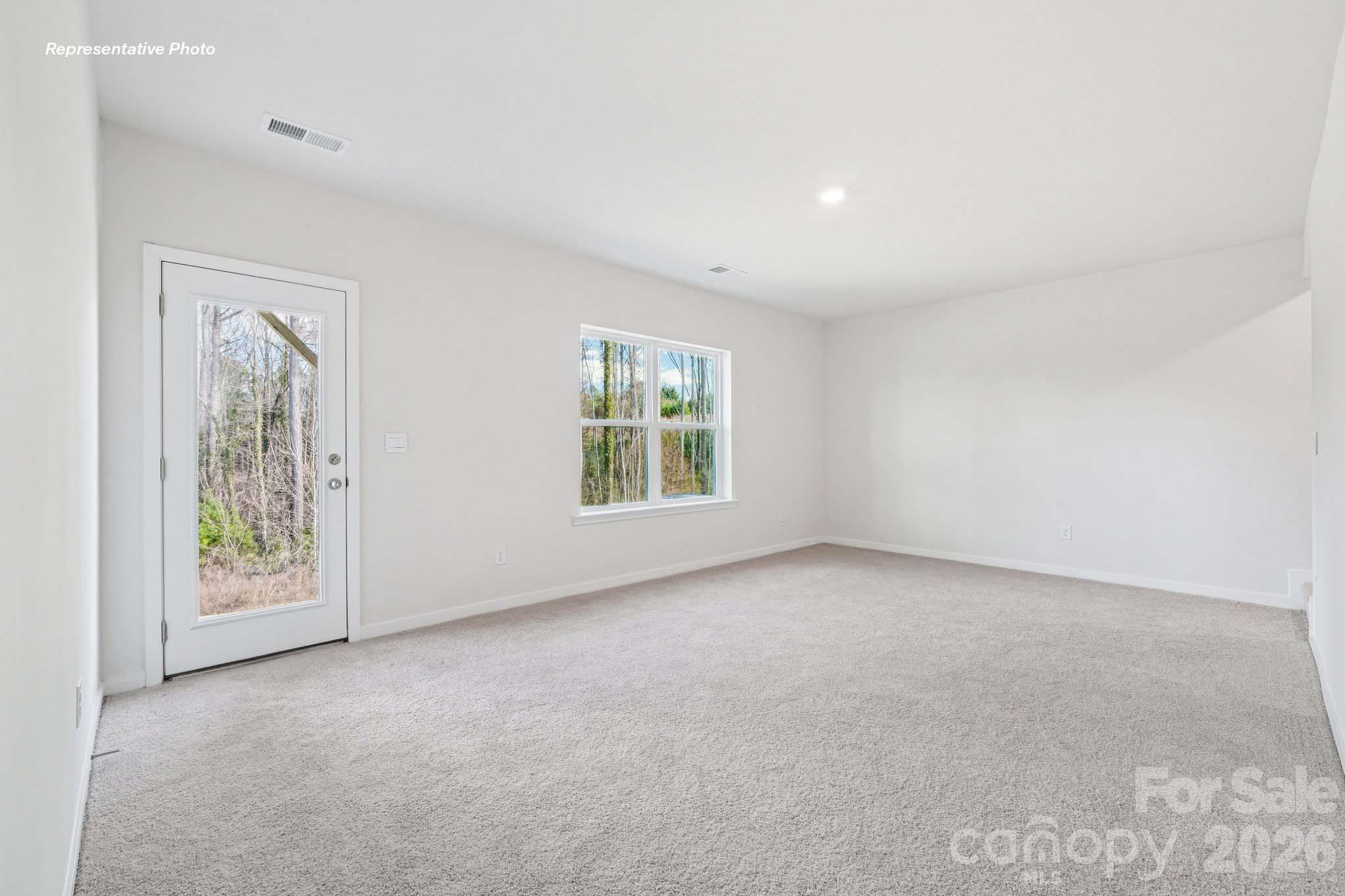 7600 Bainbridge Road Sherrills Ford, NC 28673 - Photo 36 of 39 an empty room with windows