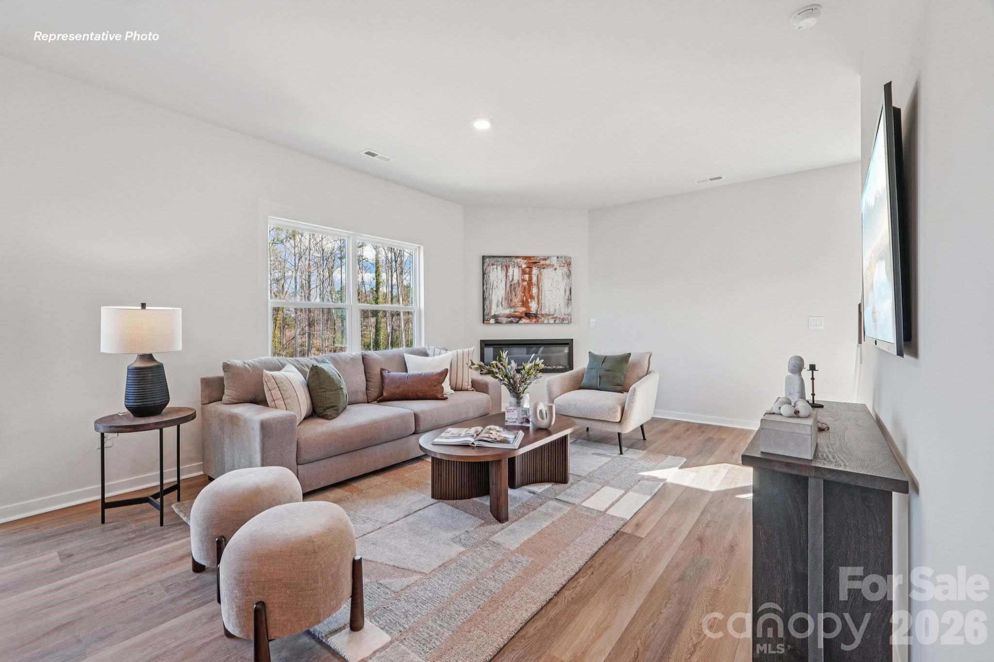 7600 Bainbridge Road Sherrills Ford, NC 28673 - Photo 4 of 39 a living room with furniture and wooden floor