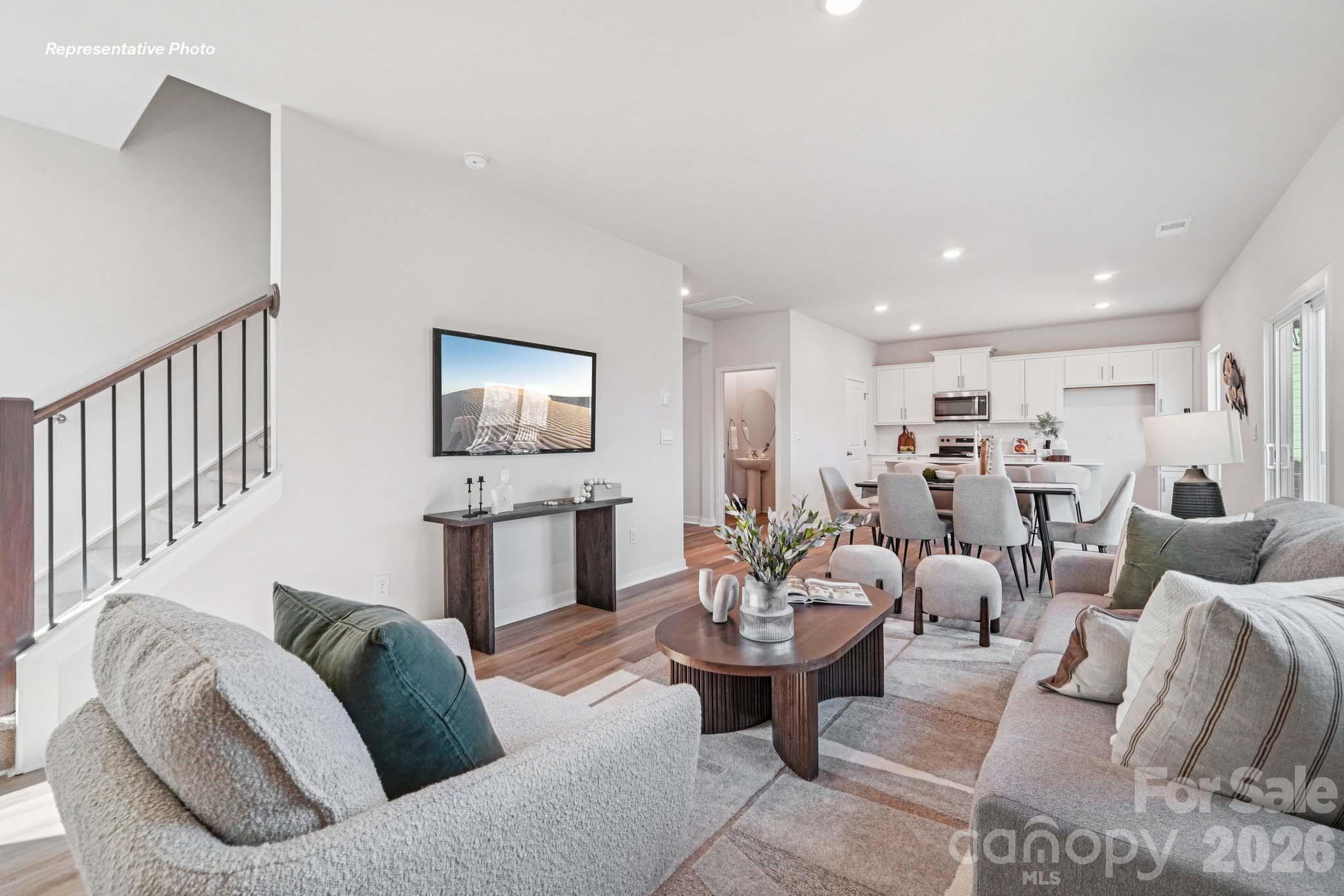 7600 Bainbridge Road Sherrills Ford, NC 28673 - Photo 6 of 39 a living room with furniture and a wooden floor