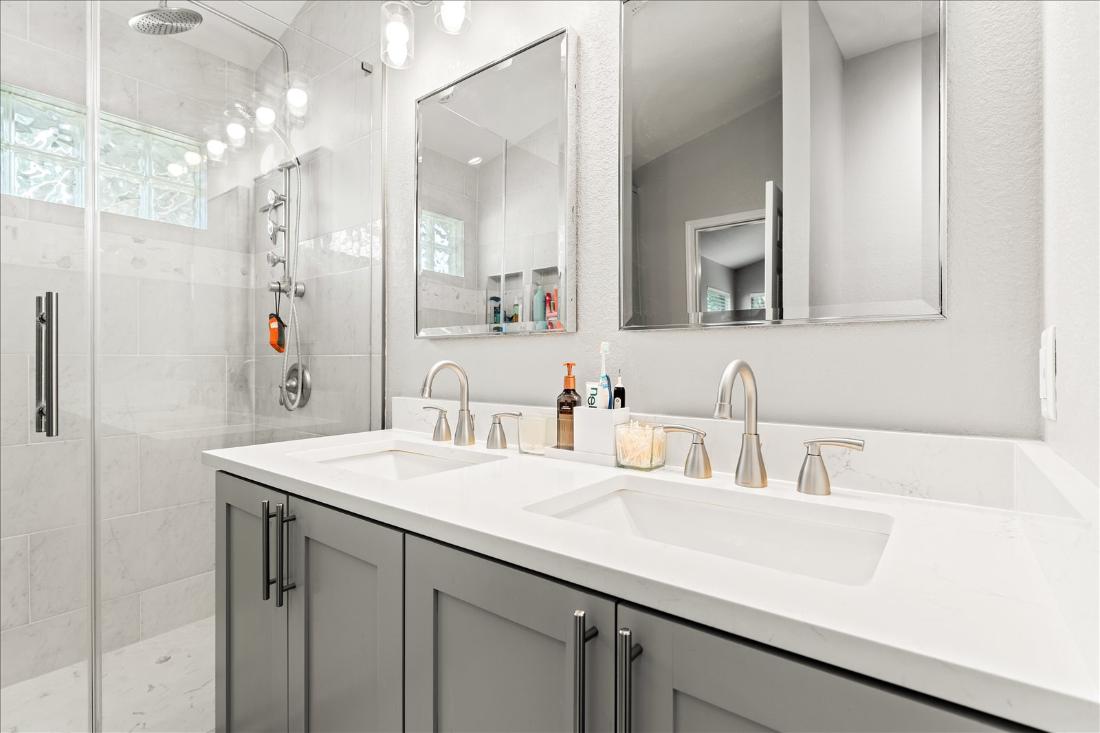 4456 Mather Kyle, TX 78640 - Photo 14 of 25 Bathroom featuring double vanity and a shower stall