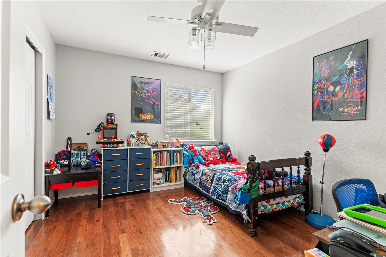 4456 Mather Kyle, TX 78640 - Photo 16 of 25 Bedroom with dark wood-style floors and ceiling fan