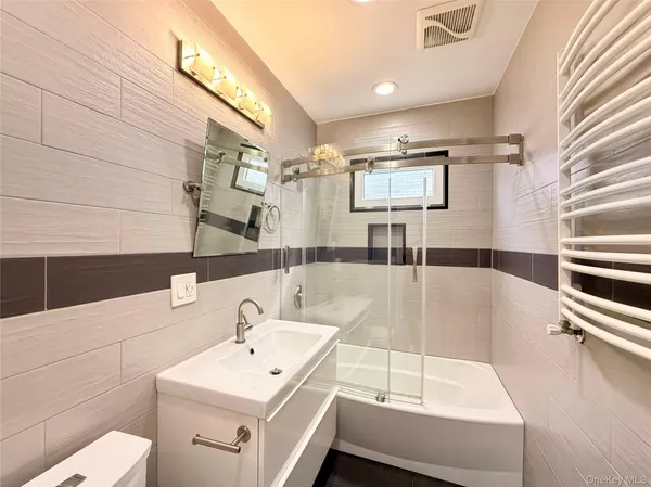 a bathroom with a sink and a bathtub