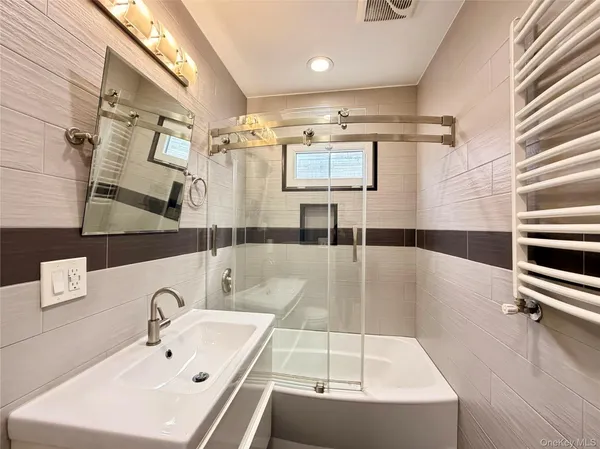 a bathroom with a sink and a tub