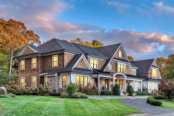 front view of a house with a yard