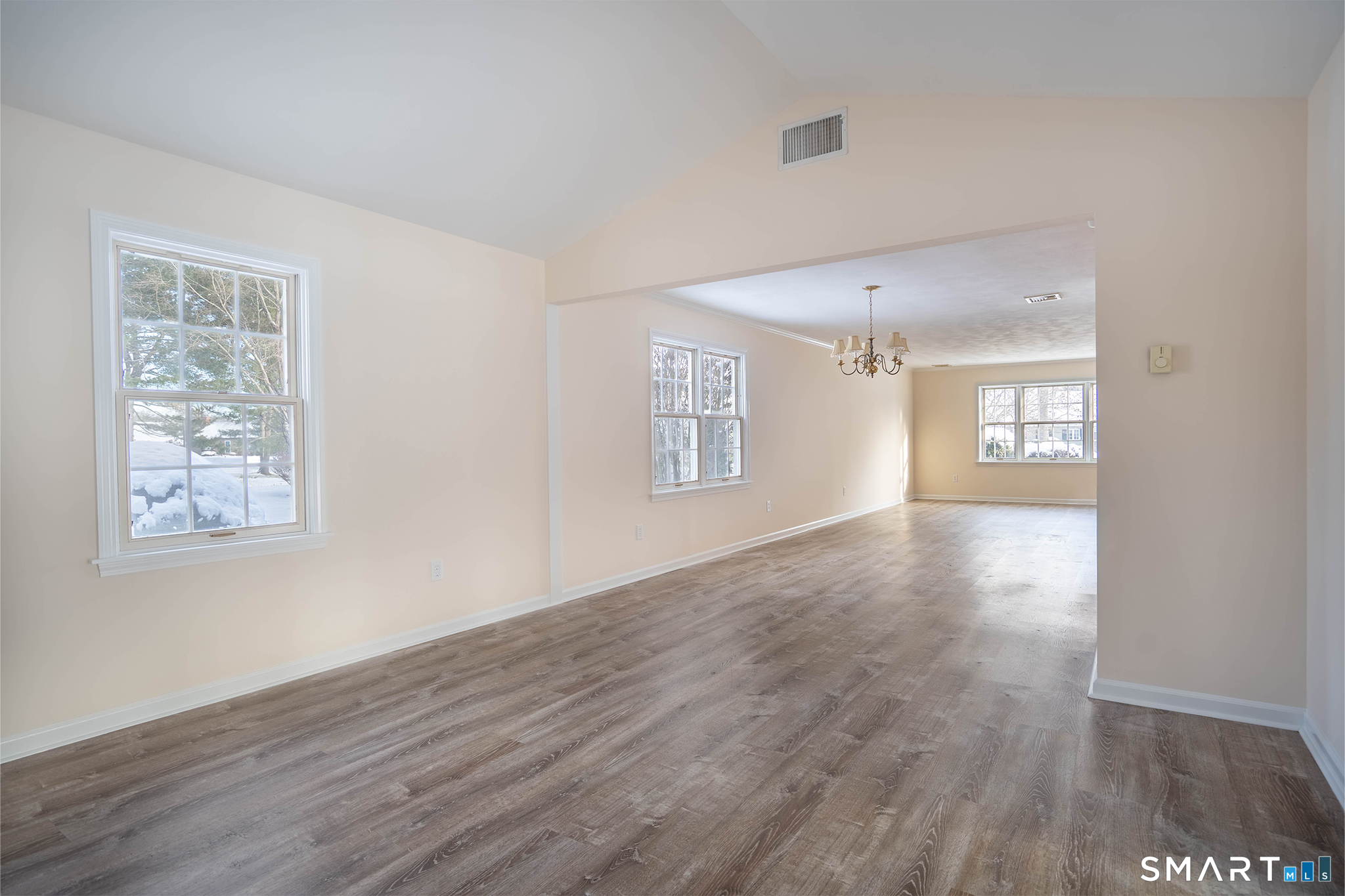4 Currycross Road, Unit 4 Madison, CT 06443 - Photo 12 of 29 an empty room with wooden floor and windows