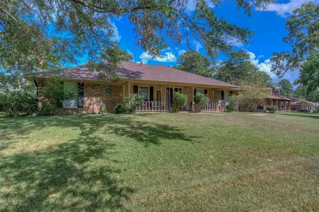 a house view with a garden space