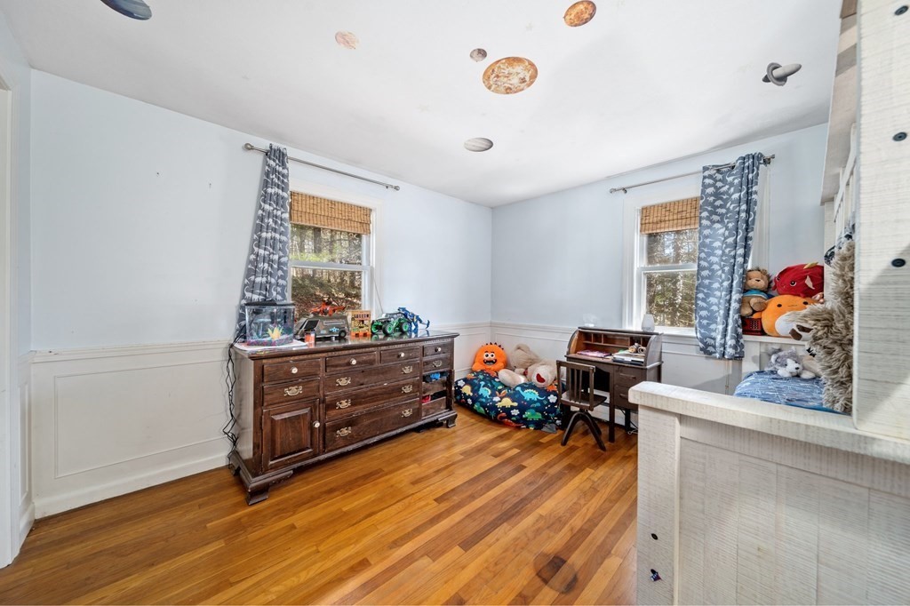 9 Bailey Lane Georgetown, MA 01833 - Photo 20 of 42 a room with furniture and a window