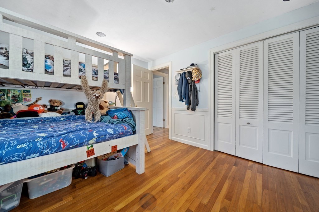 9 Bailey Lane Georgetown, MA 01833 - Photo 21 of 42 a bed room with a bed and a walk in closet