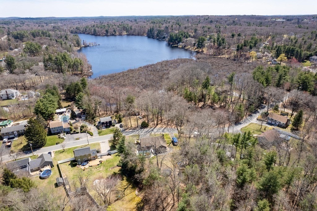 9 Bailey Lane Georgetown, MA 01833 - Photo 40 of 42 a view of a forest with a beach