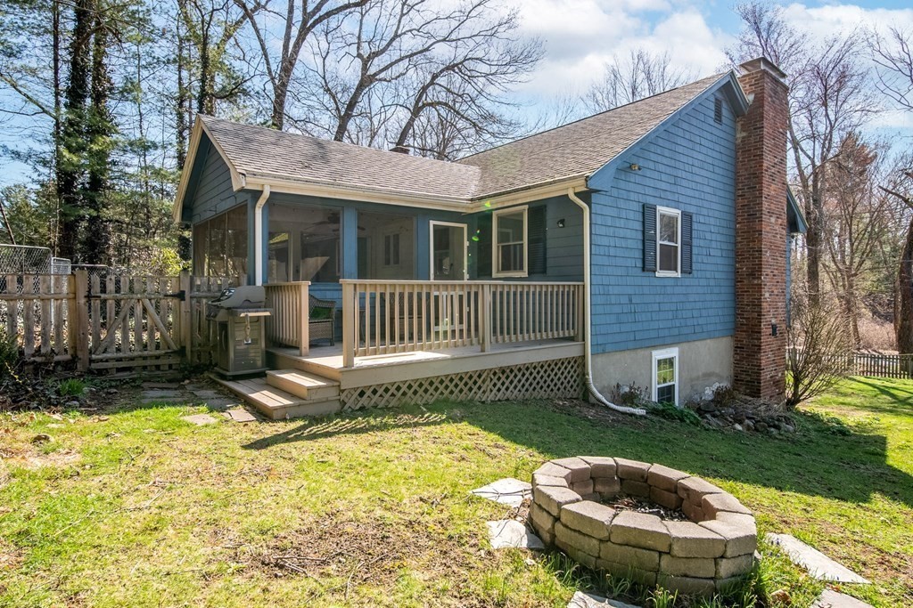 9 Bailey Lane Georgetown, MA 01833 - Photo 5 of 42 a view of a house with backyard and sitting area