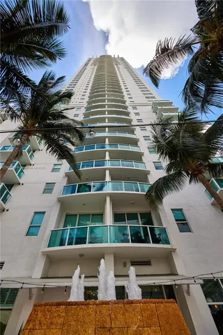 a view of buildings and yard