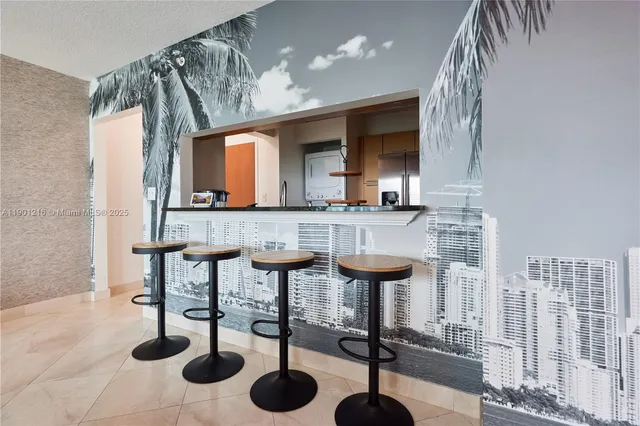 a view of a kitchen with appliances and cabinets