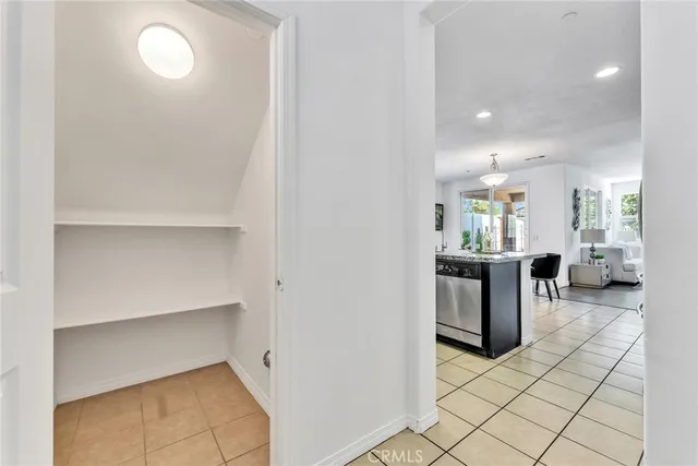 a view of a workspace with furniture