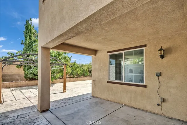 an aerial view of a house with a garden
