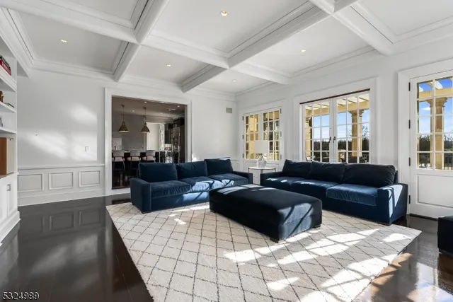 a living room with furniture window and lamp