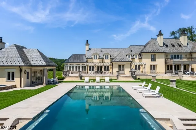 a view of a dining room with furniture and a very nice looking table