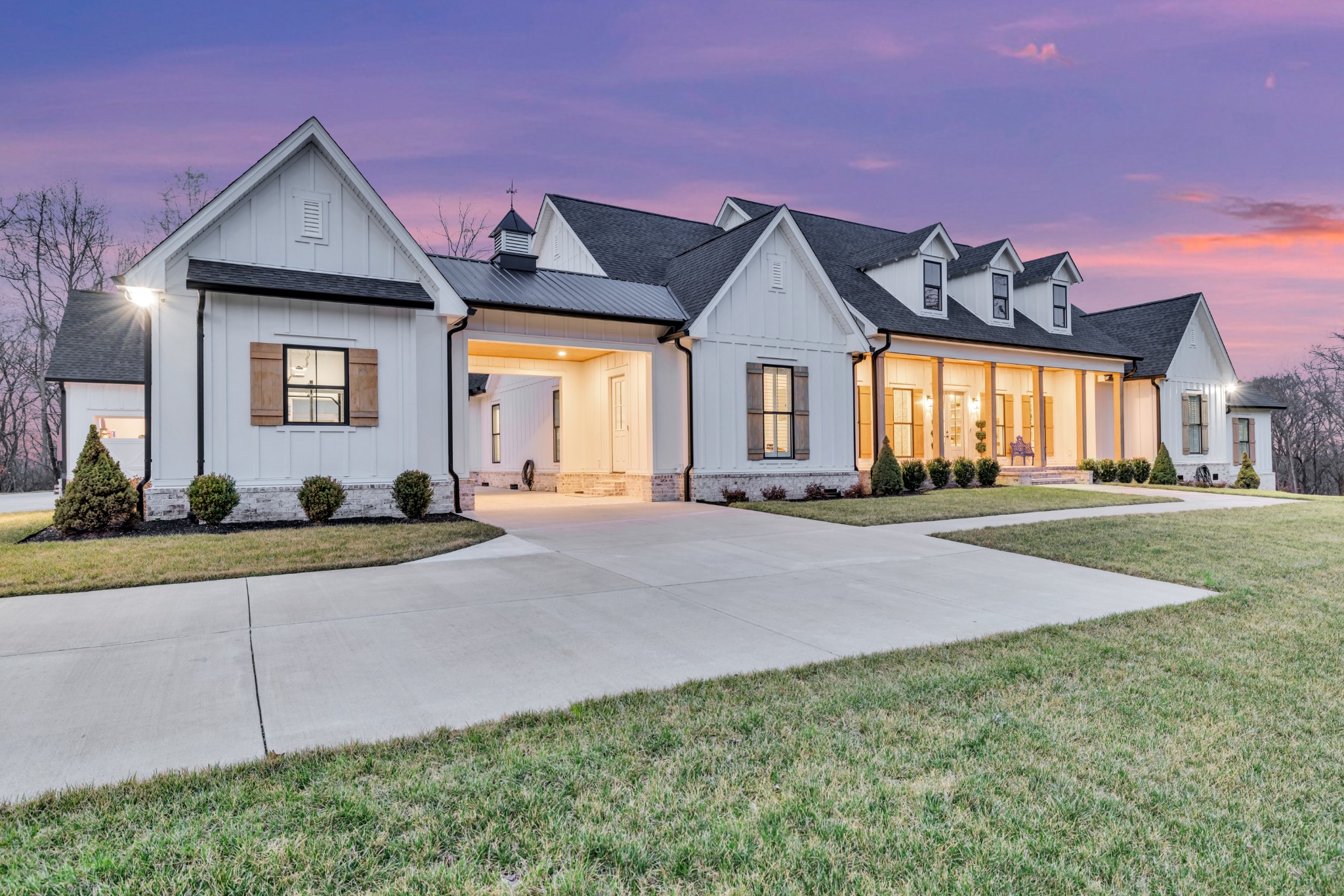 1095 Sam Johnson Road Columbia, TN 38401 - Photo 4 of 69 a front view of a house with a yard and outdoor seating