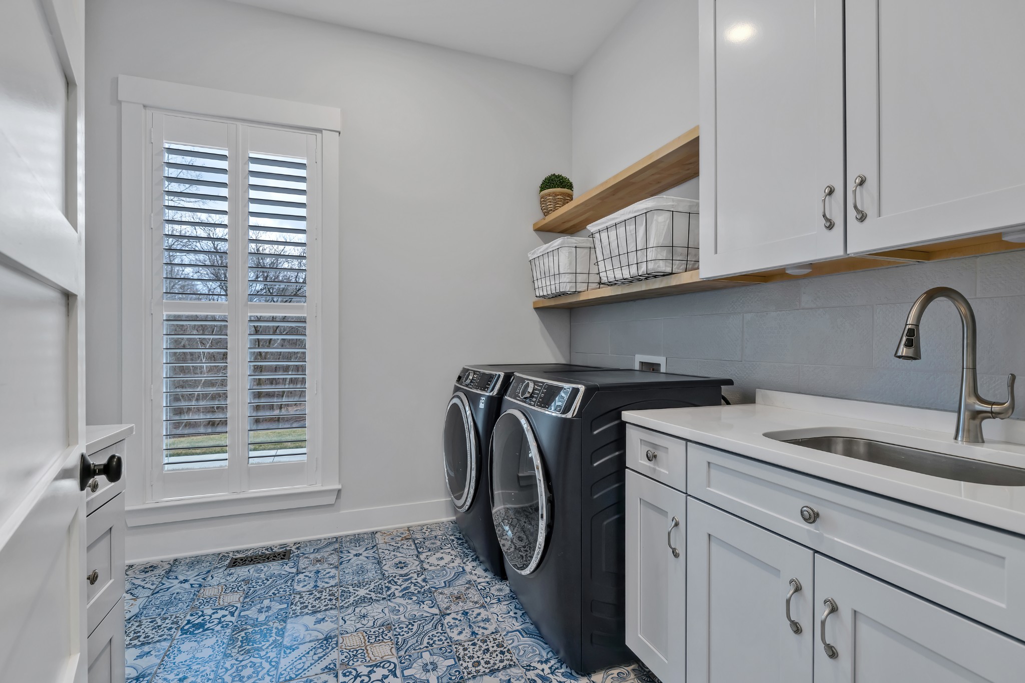 1095 Sam Johnson Road Columbia, TN 38401 - Photo 47 of 69 a utility room with cabinets