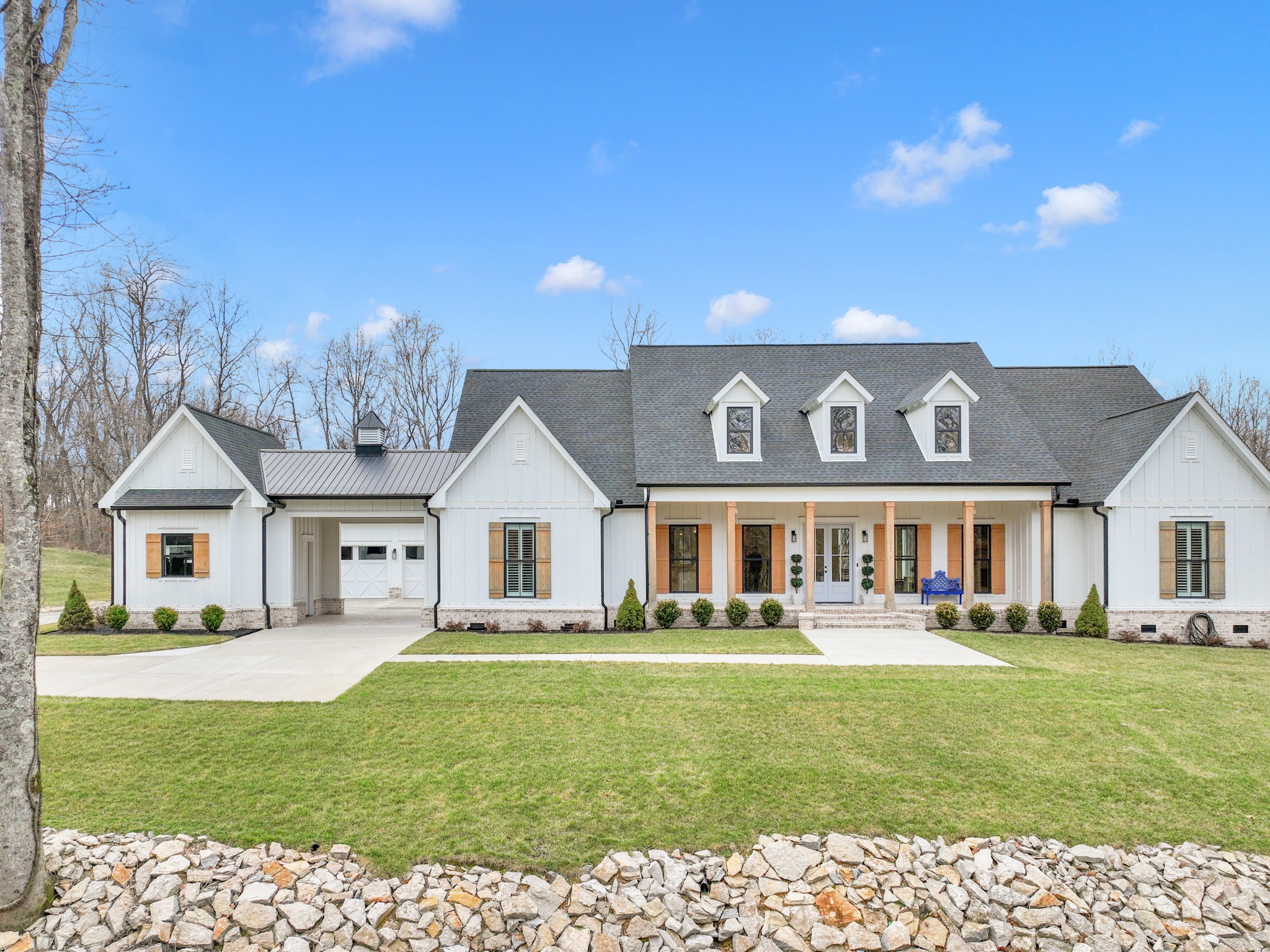 1095 Sam Johnson Road Columbia, TN 38401 - Photo 5 of 69 a front view of a house with a garden and plants