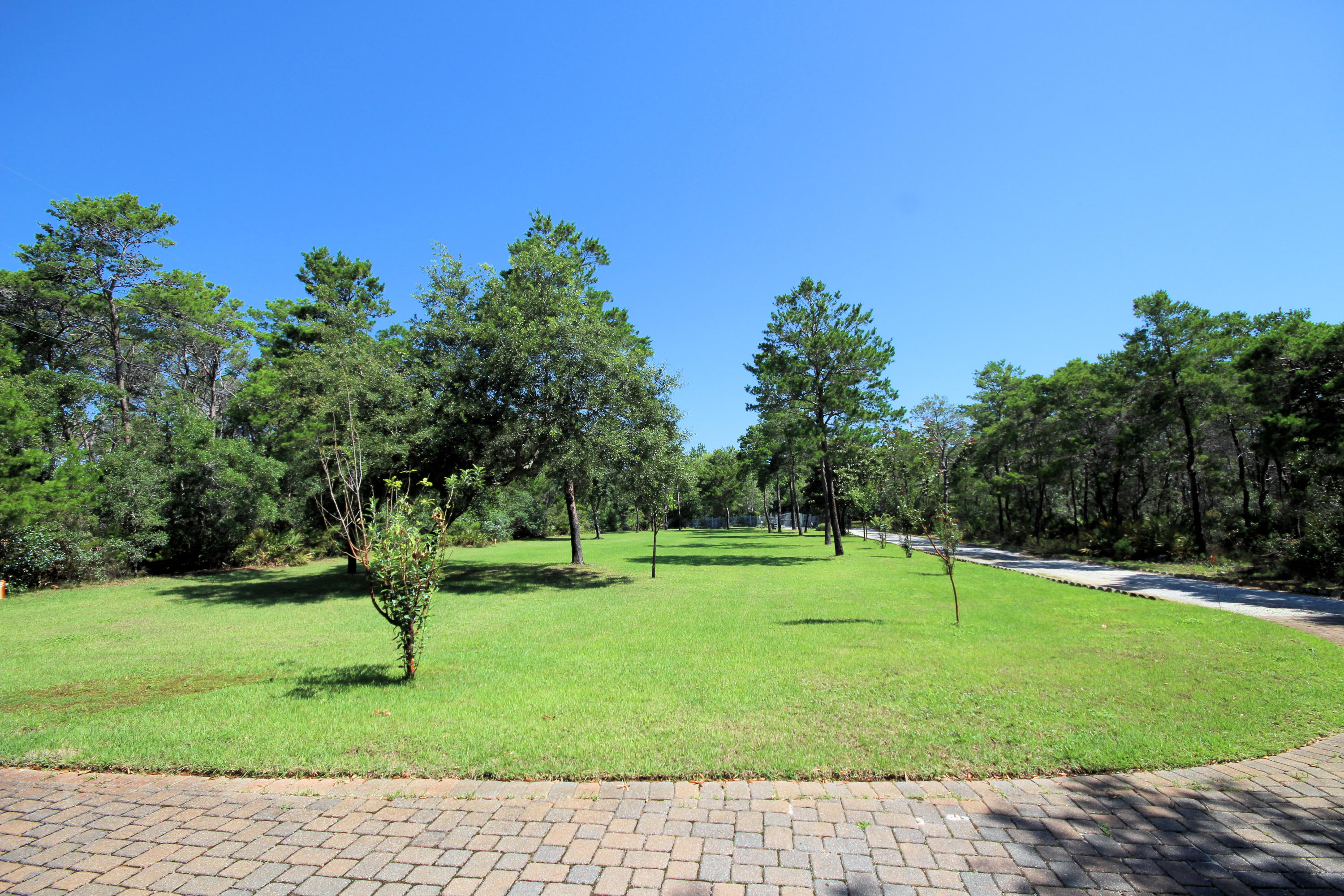 497 Walton Way Miramar Beach, FL 32550 - Photo 11 of 47 a view of a park with swings