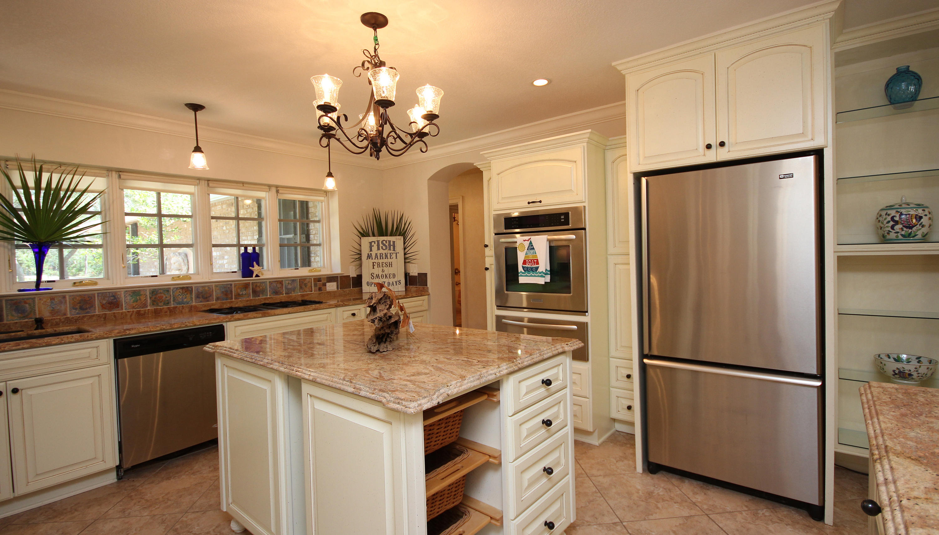 497 Walton Way Miramar Beach, FL 32550 - Photo 16 of 47 a kitchen with a refrigerator and countertop