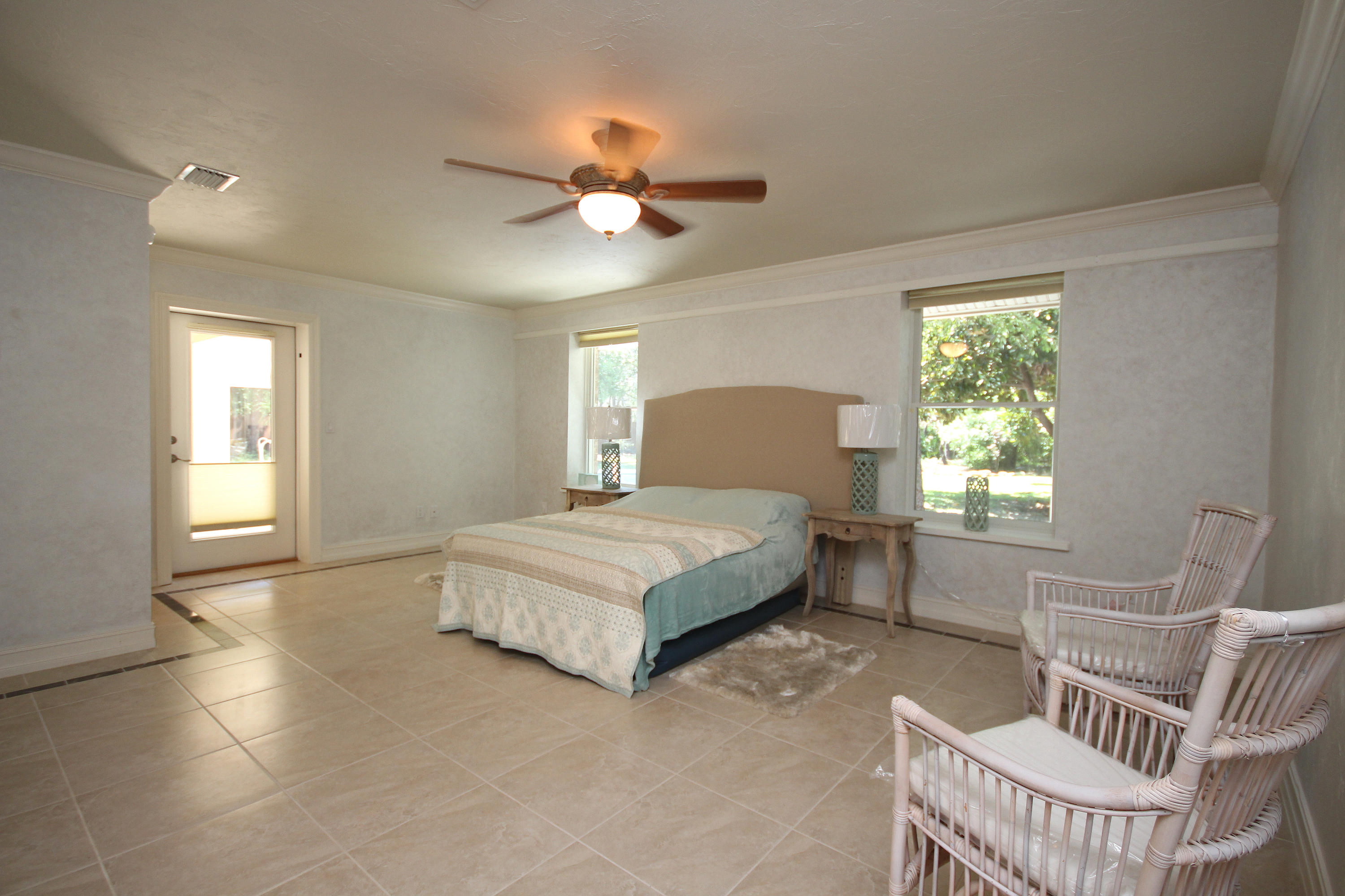 497 Walton Way Miramar Beach, FL 32550 - Photo 20 of 47 a bedroom with a bed and window