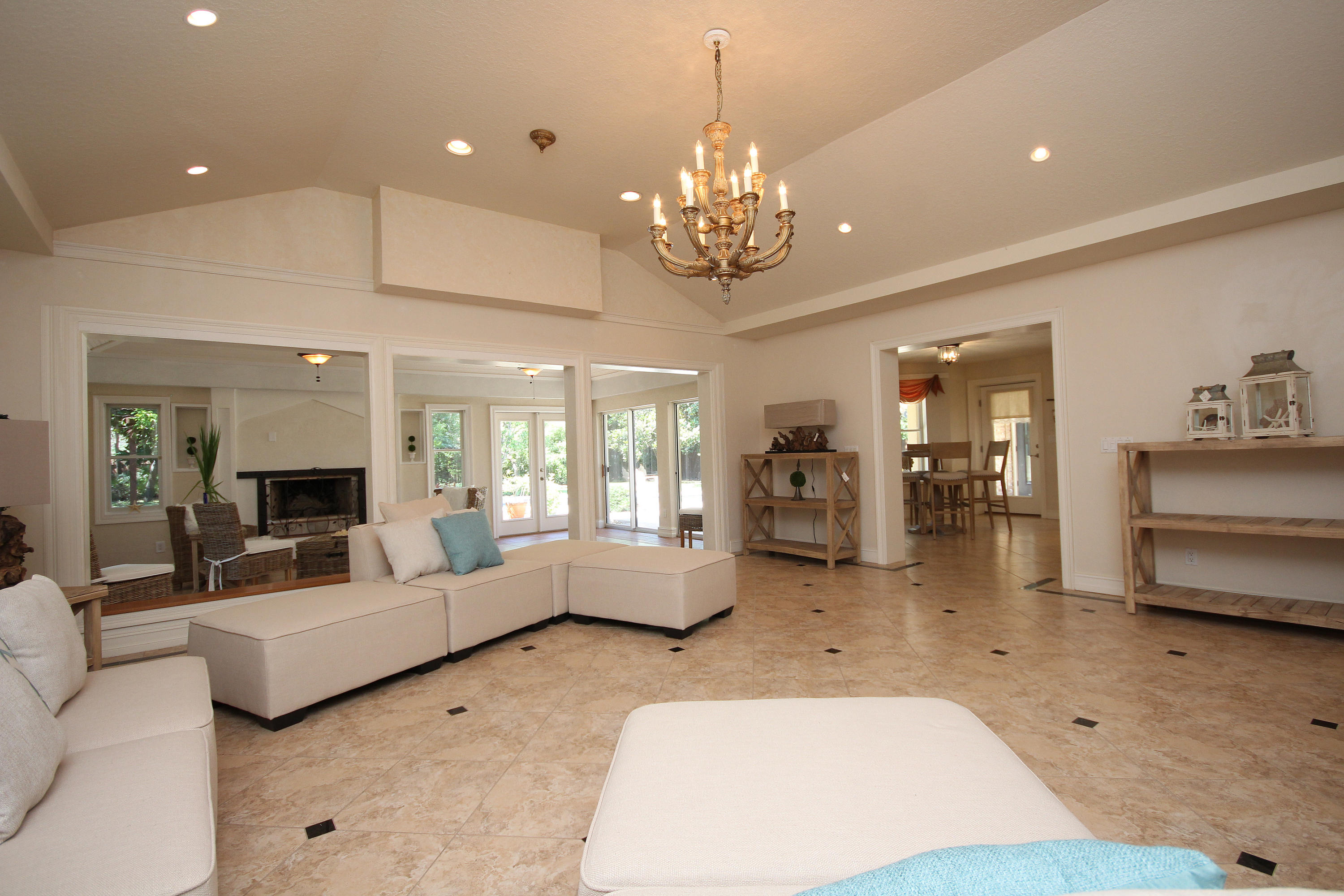 497 Walton Way Miramar Beach, FL 32550 - Photo 4 of 47 a living room with furniture and a chandelier