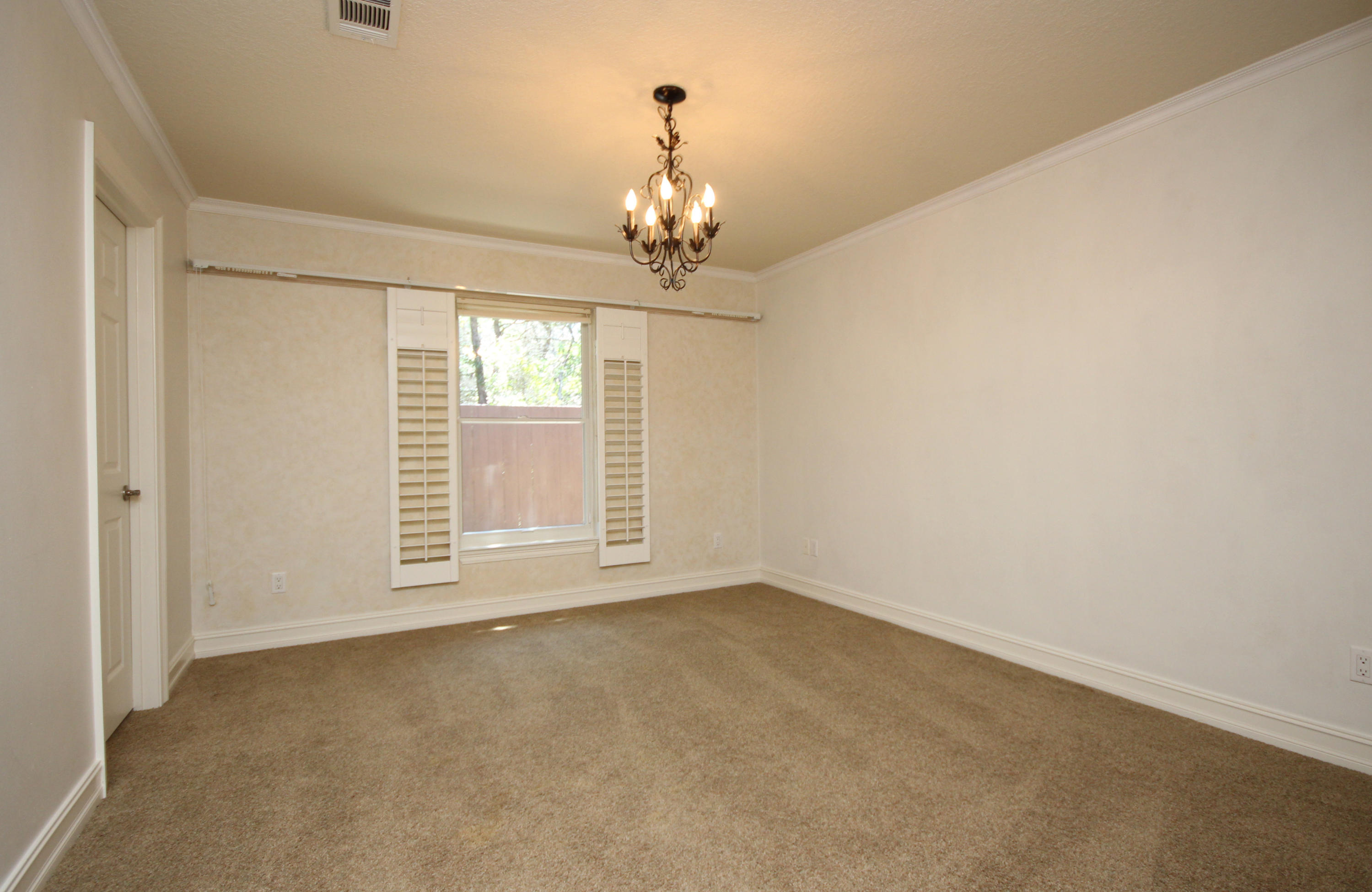 497 Walton Way Miramar Beach, FL 32550 - Photo 33 of 47 wooden floor in an empty room with a window