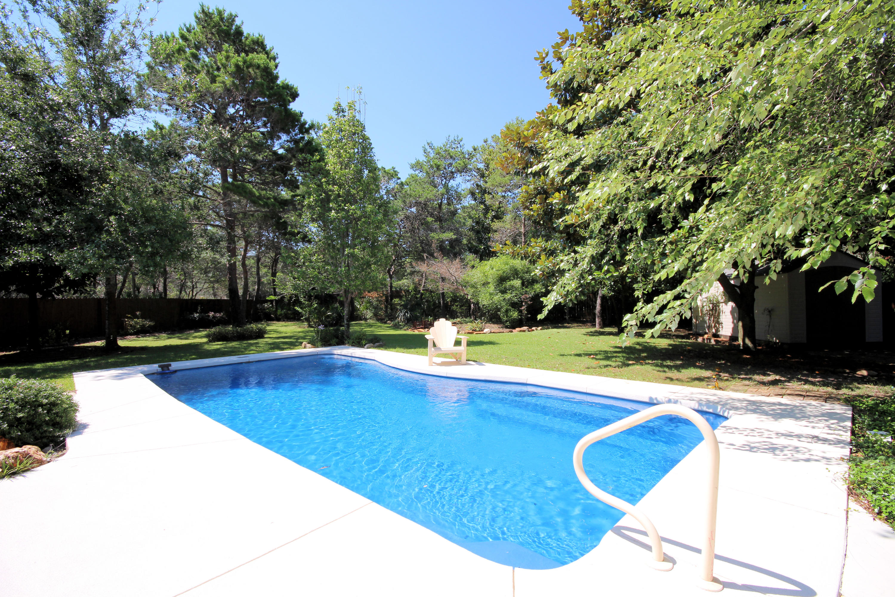 497 Walton Way Miramar Beach, FL 32550 - Photo 36 of 47 a view of swimming pool with a yard
