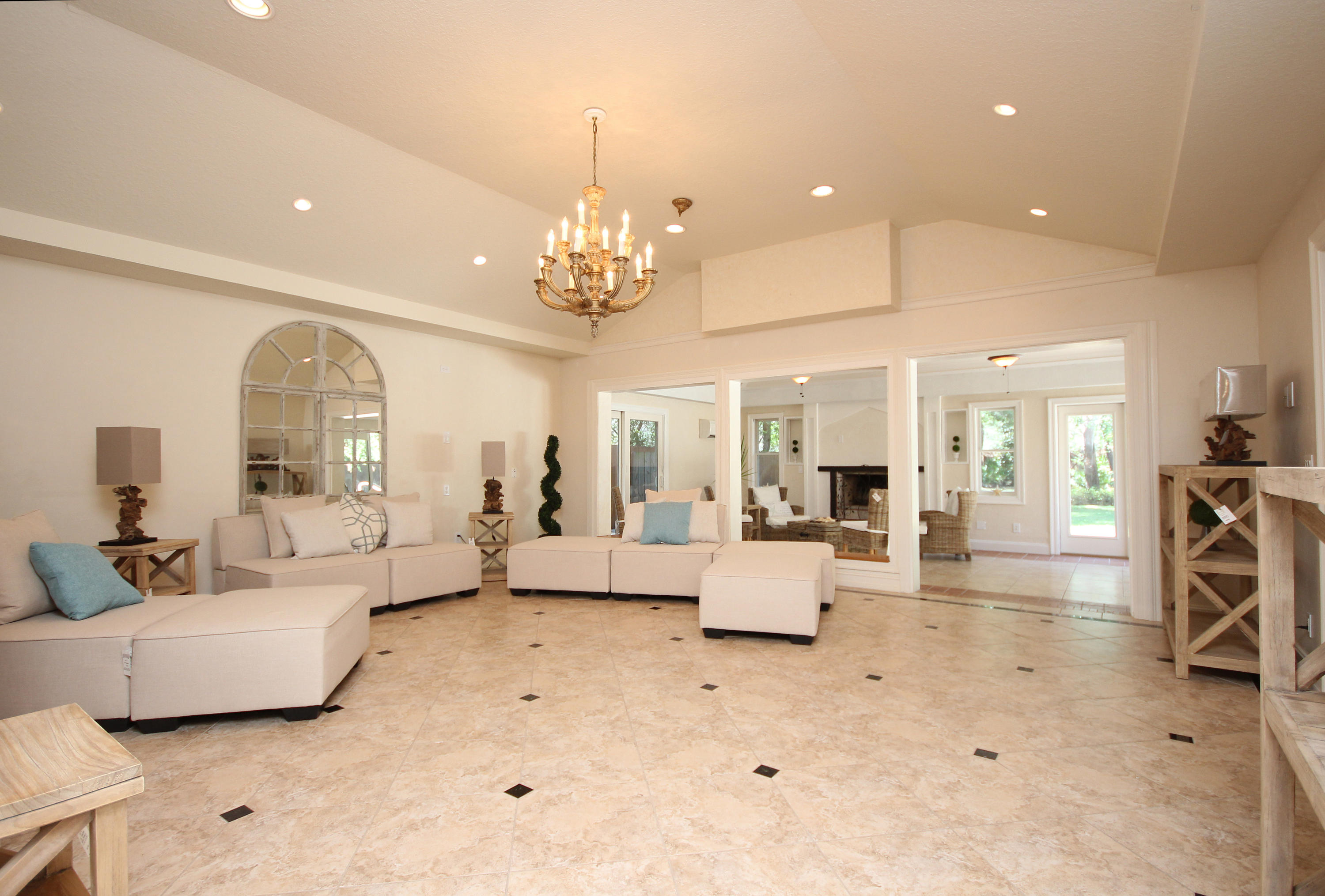 497 Walton Way Miramar Beach, FL 32550 - Photo 5 of 47 a living room with furniture and a chandelier