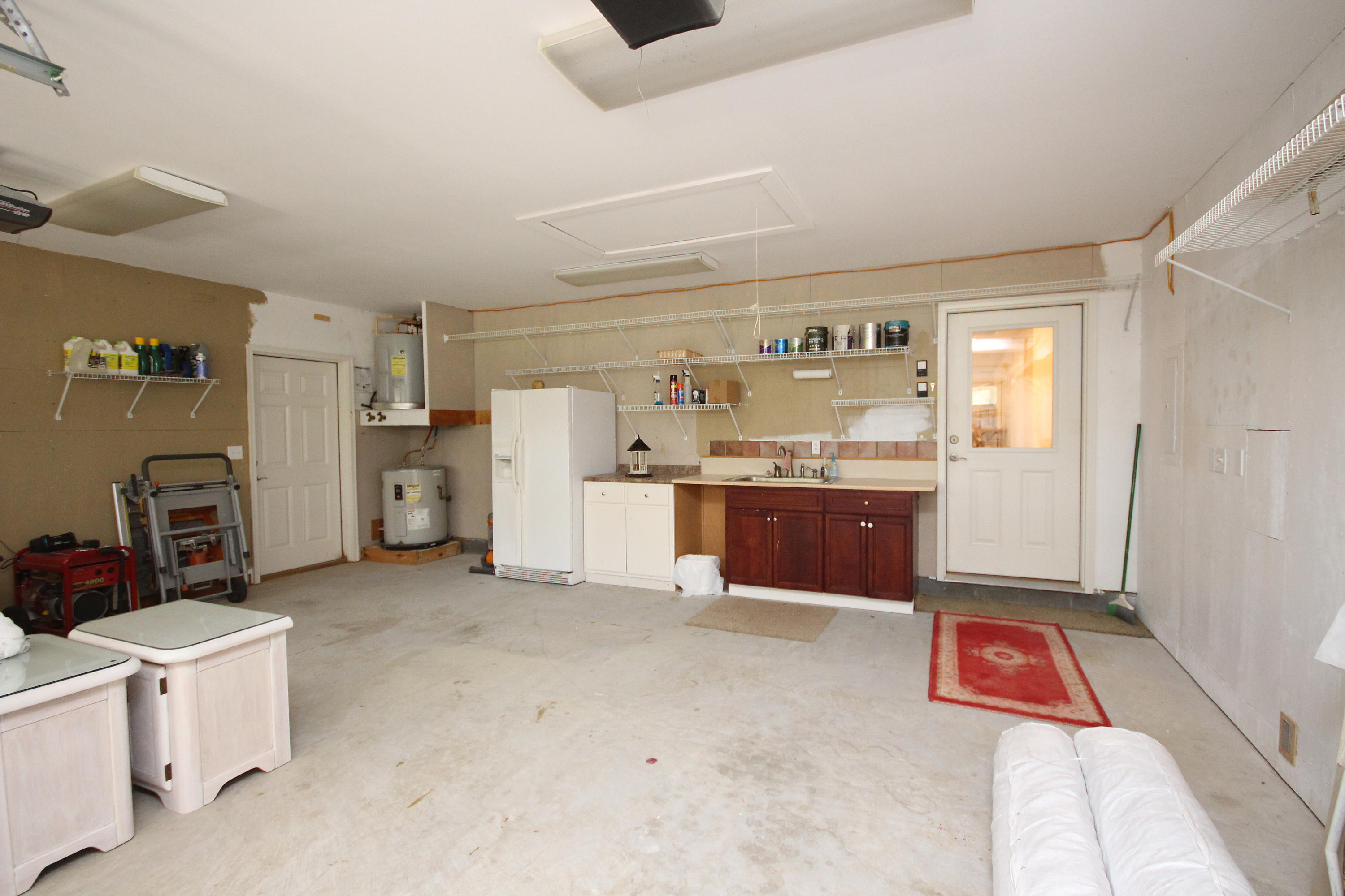 497 Walton Way Miramar Beach, FL 32550 - Photo 44 of 47 a kitchen with stainless steel appliances a sink and a refrigerator