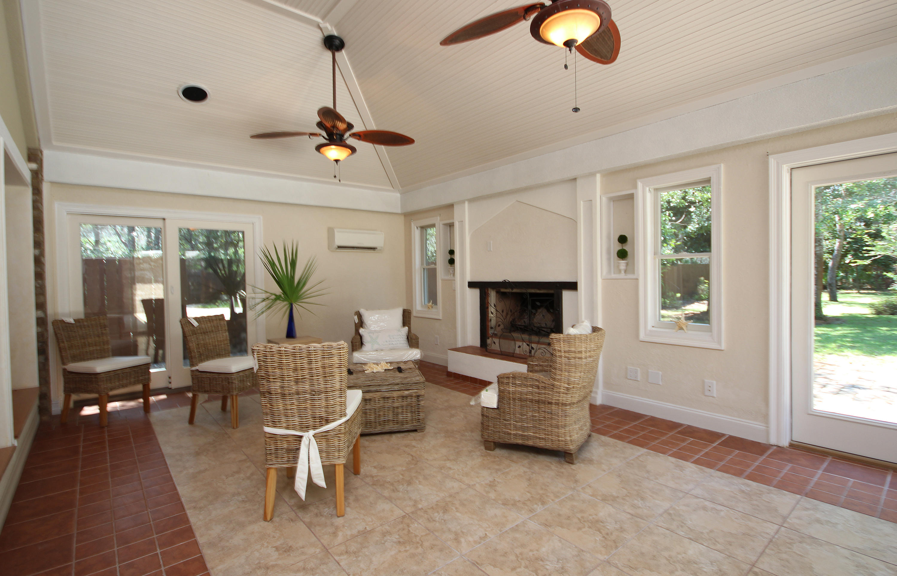 497 Walton Way Miramar Beach, FL 32550 - Photo 7 of 47 a living room with furniture a window and a chandelier