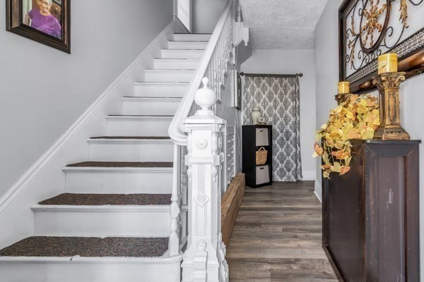 11 Cambridge Street Lawrence, MA 01843 - Photo 5 of 40 a view of entryway and hall with wooden floor