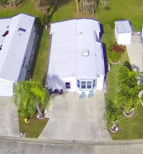 458 Vanda Sanctuary Naples, FL 34114 - Photo 1 of 50 an aerial view of a house