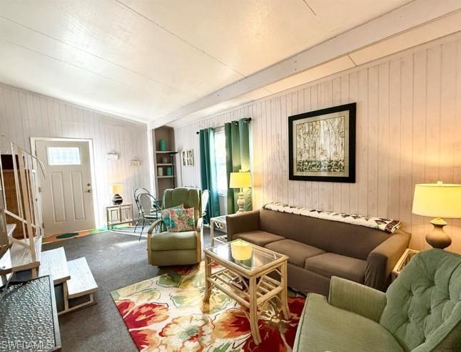 458 Vanda Sanctuary Naples, FL 34114 - Photo 12 of 50 a living room with furniture and a couch