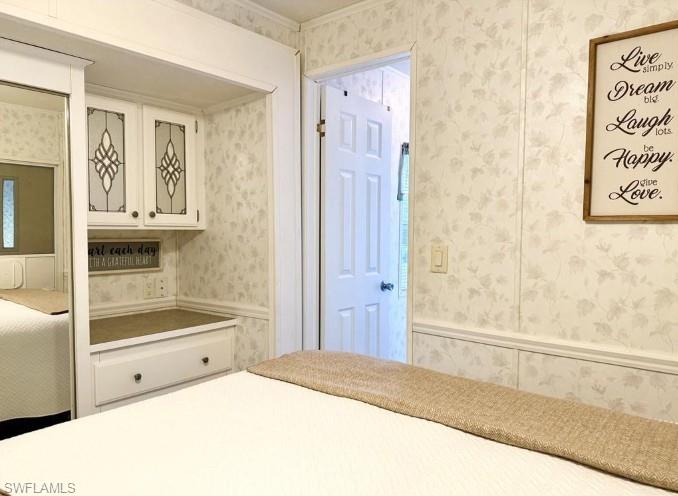 458 Vanda Sanctuary Naples, FL 34114 - Photo 25 of 50 a bathroom with a tub sink and mirror