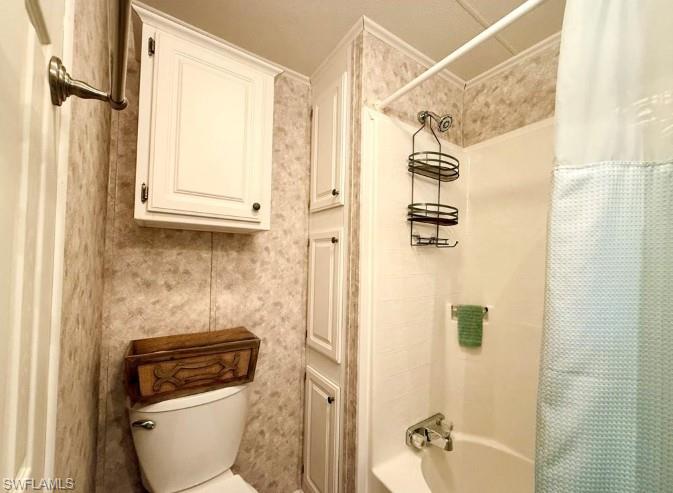 458 Vanda Sanctuary Naples, FL 34114 - Photo 26 of 50 a bathroom with a toilet and a shower