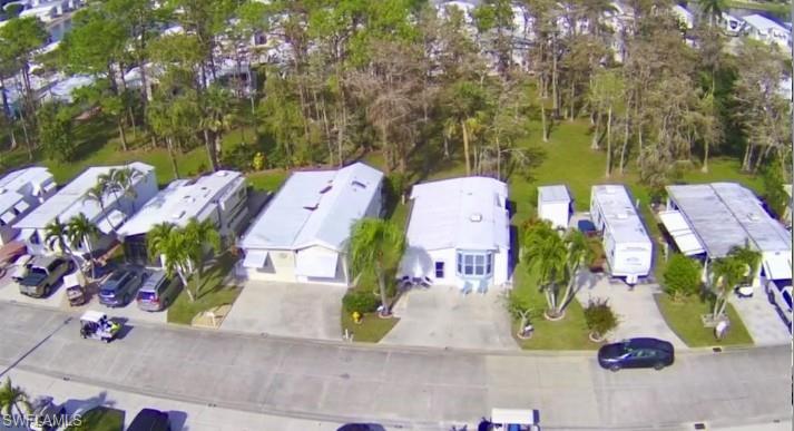 458 Vanda Sanctuary Naples, FL 34114 - Photo 30 of 50 an aerial view of a house with a yard basket ball court