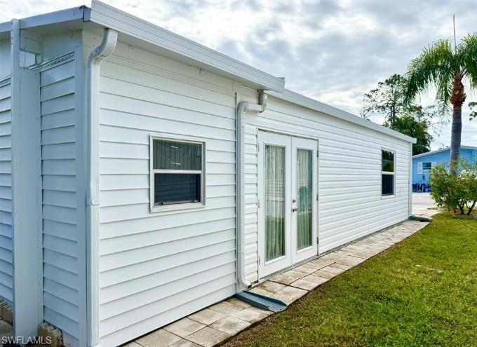 458 Vanda Sanctuary Naples, FL 34114 - Photo 6 of 50 a view of a back yard of the house