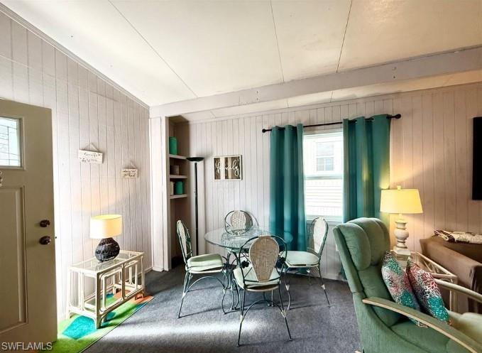 458 Vanda Sanctuary Naples, FL 34114 - Photo 9 of 50 a living room with furniture and a window