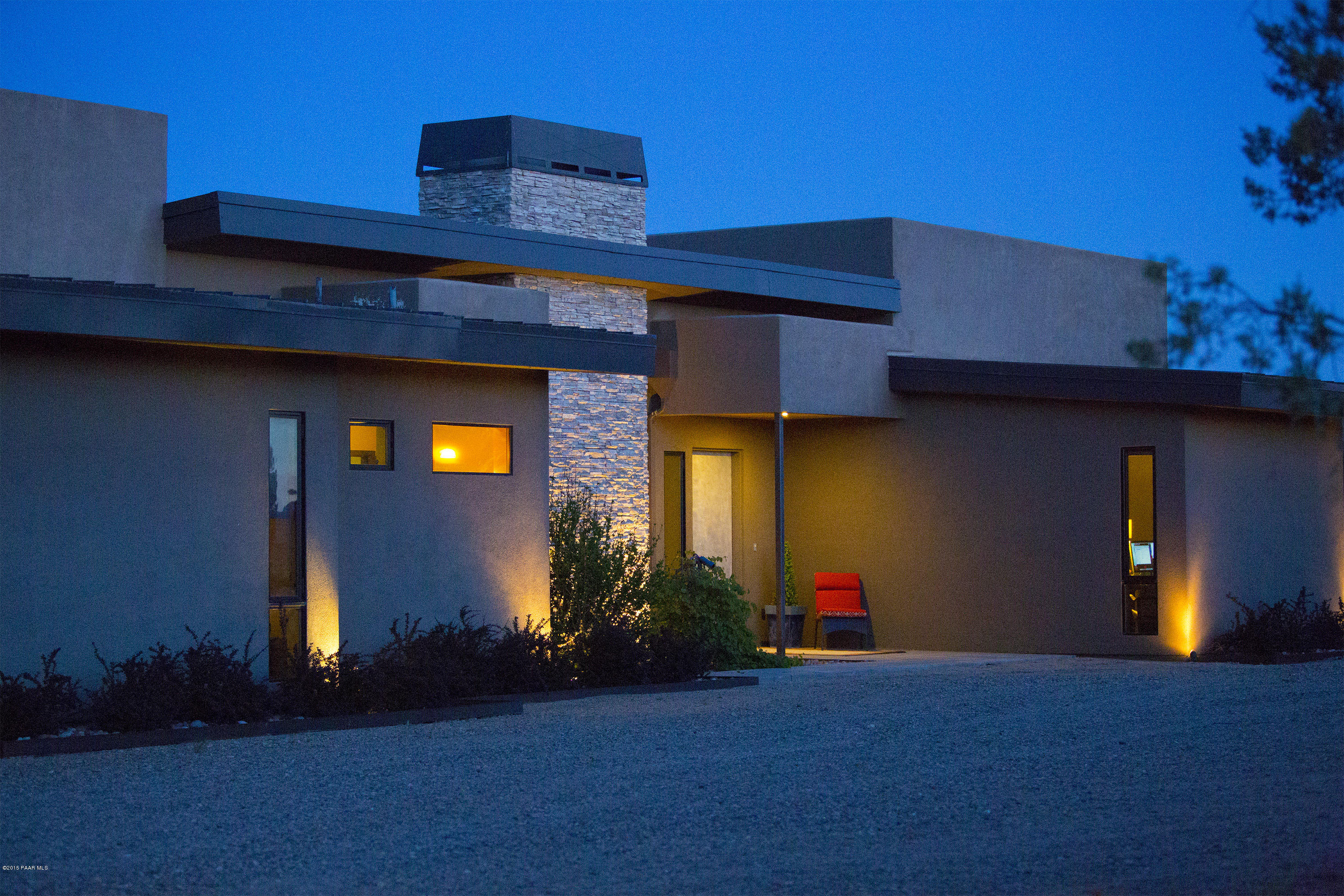 19925 North Lower Territory Road Prescott, AZ 86305 - Photo 1 of 41 a view of a house with many windows and plants