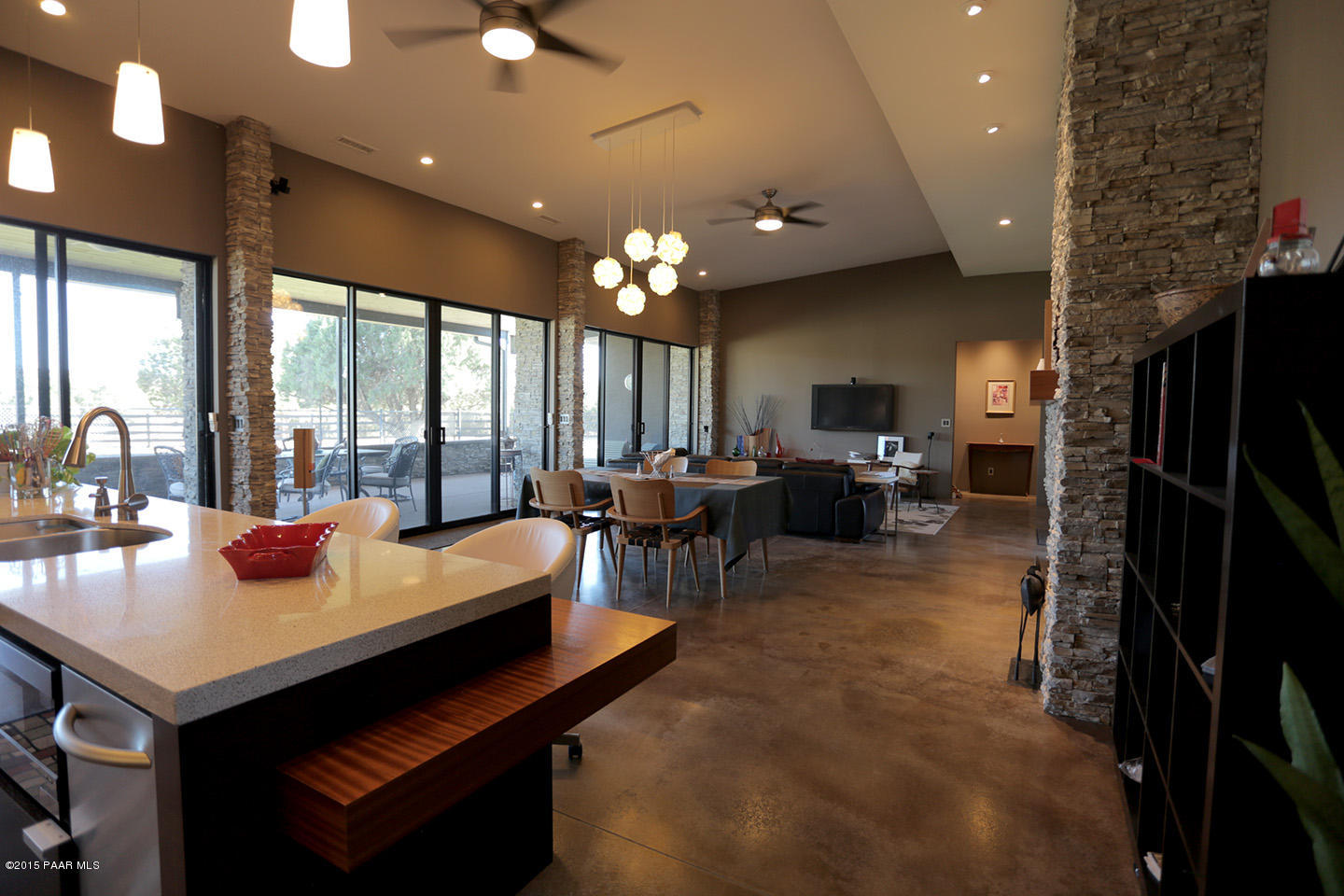 19925 North Lower Territory Road Prescott, AZ 86305 - Photo 9 of 41 a living room with fireplace furniture and a large window